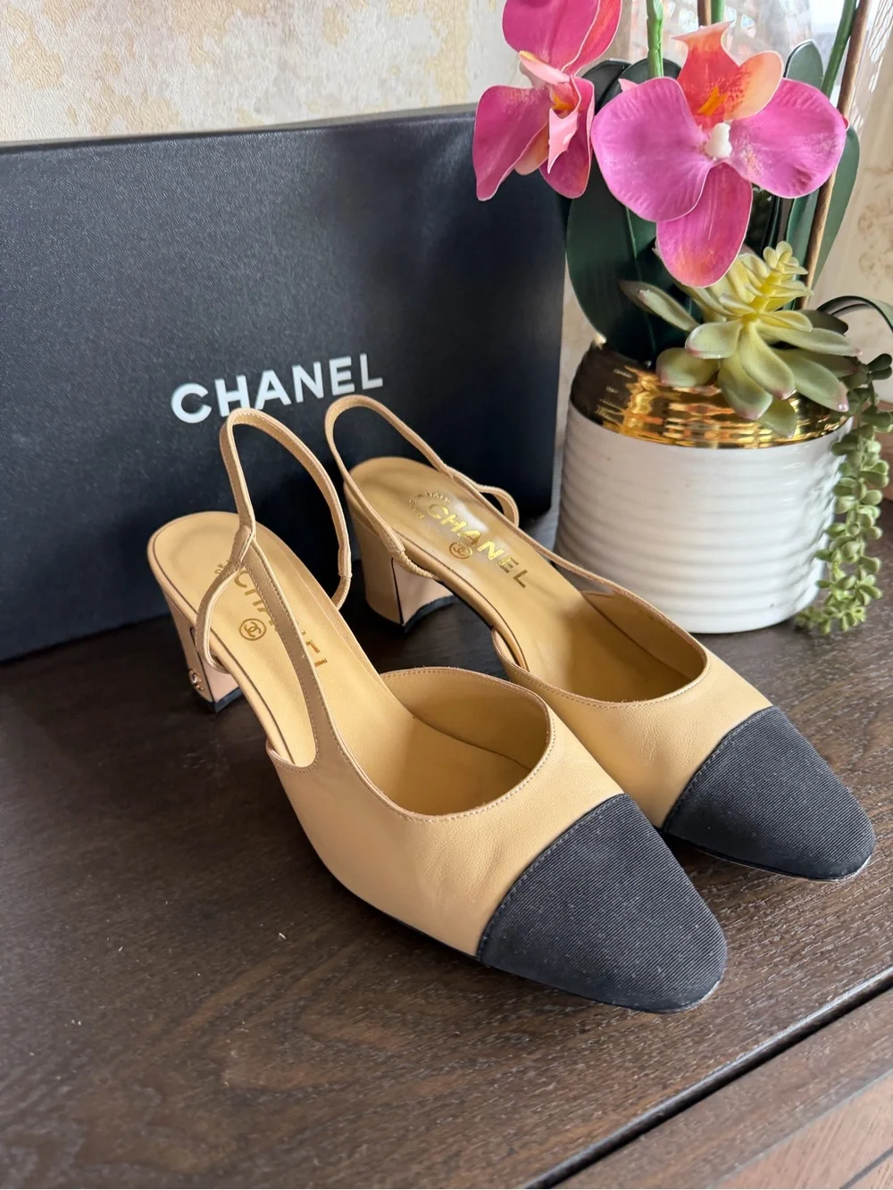 CHANEL Beige Leather Slingback Pumps with Black Cap Toe